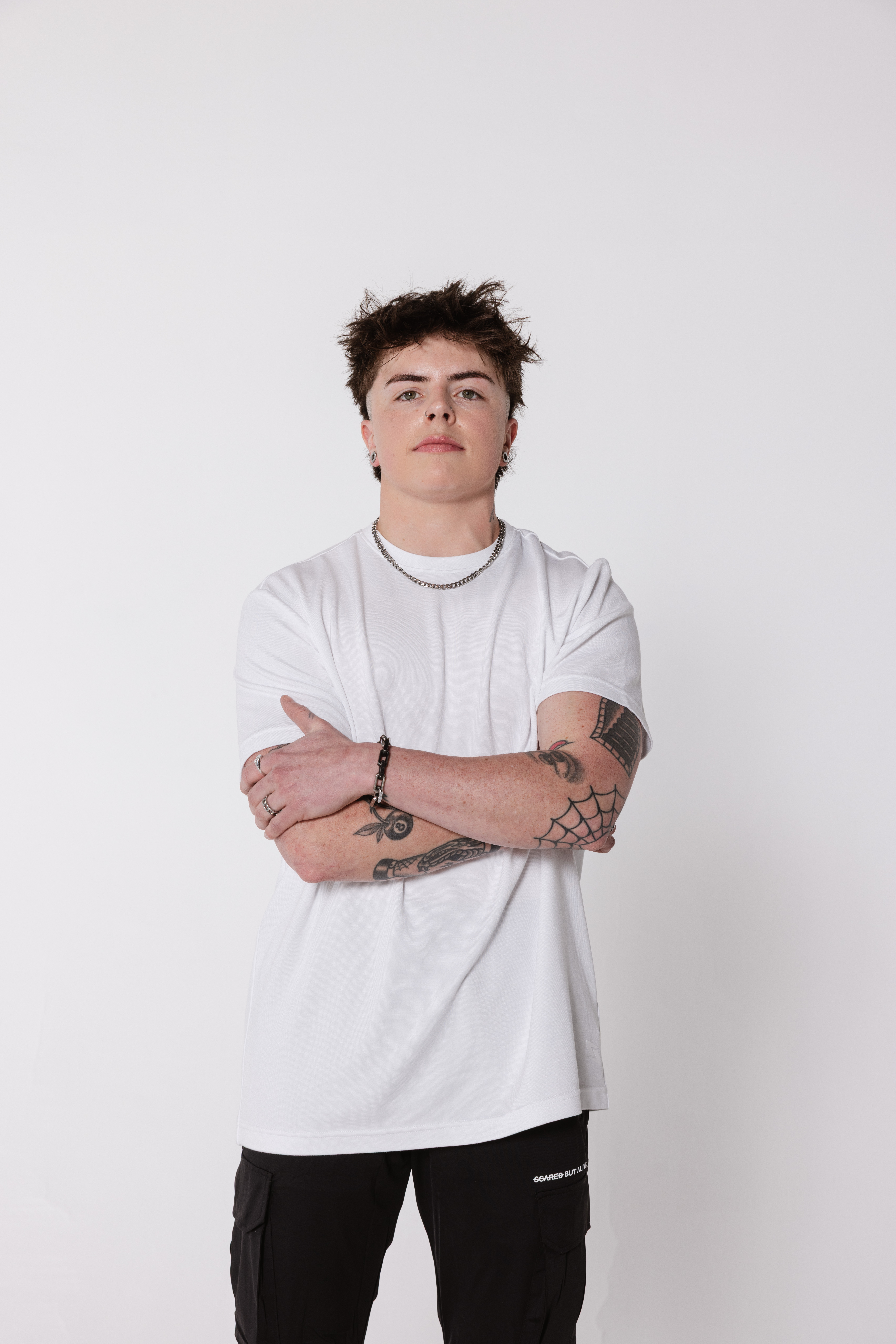 White COMF+ tee collar, drape, hand, and face on body